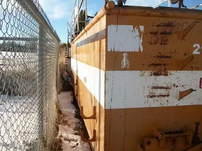 USED 24 M3 (150 BBL) SKID MOUNTED 2 COMPARTMENT MUD TANK
