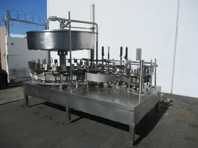 Gravity feed, 1 gallon bottle filling machine w/ 24 heads