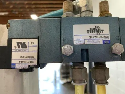 Pneumatic Press on Chain Conveyor