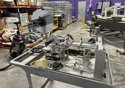 USED UNIVERSAL LABELING SYSTEMS R-310