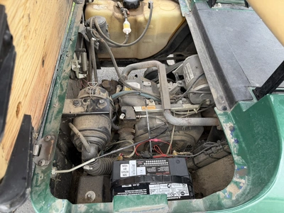 (1) 2015 E-Z-Go golf cart with a Kawasaki gas engine, includes canopy, fold-down windshield, and bal...