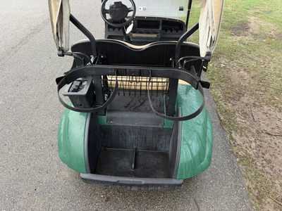 (1) 2015 E-Z-Go golf cart with a Kawasaki gas engine, includes canopy, ball cover, club cover, fold-...