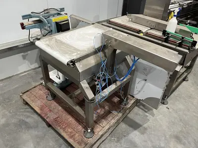 Ram Reject Conveyor