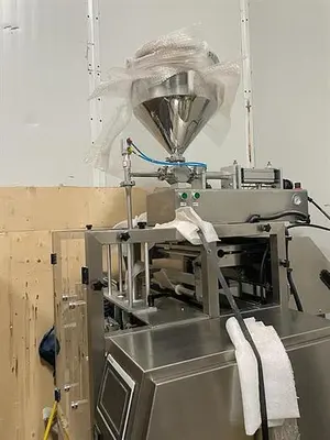 TDI Form, Fill and Seal with Piston Filler