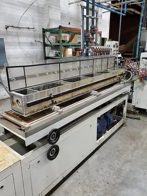 KRAUSS-MAFFEI KME 60 SX      Krauss Maffei Used KME 60 SX Profile Extrusion Line –  2015