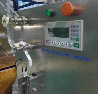 Used Desicant Inserter Model PDI-60