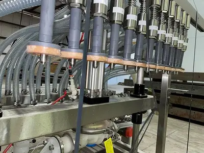 USED APEX FILLING SYSTEMS POF-12 12 SPOUT PRESSURE LIQUID FILLER