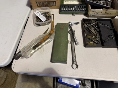 Large lot of assorted hand tools, includes saws, wrenches, sockets, drill bits, Allen extensions, pl...
