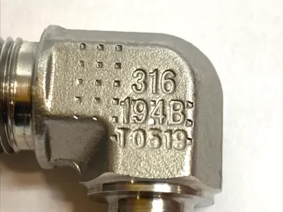 USED PARKER STAINLESS 90° ELBOW MALE NPT X 37° FLARE