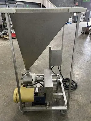 Progressive Cavity Pump With Hopper