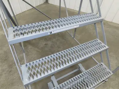 Uline H-1868 Rolling Ladder 4 Step 36" Work Platform 40" Top Step 800lbs Cap