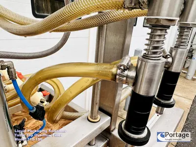 USED 2010 LIQUID PACKAGING 310-150 TT OVERFLOW FILLER