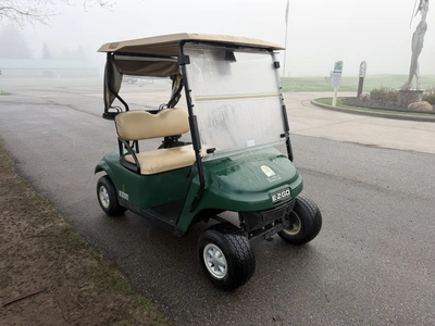(1) 2015 E-Z-Go golf cart with a Kawasaki gas engine, includes canopy, ball cover, club cover, fold-...