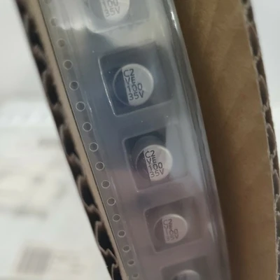 *NEW* REEL OF 500 Cornell Dubilier AVE107M35F24T-F Aluminum Electrolytic 100uF