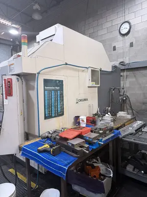 Used 2011 OKUMA GENOS 560V Vertical Machining Centers Illinois US | Machinery Marketing International #1229251