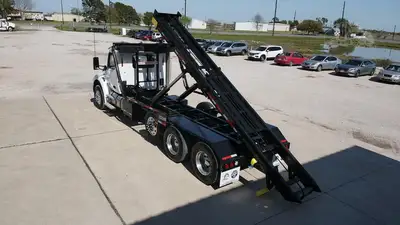 New | in-Stock 2027 PETERBILT 548 Rolloff Trucks Texas US | Roll Off Truck World #1492012