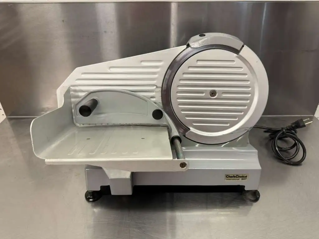Used Chefs Choice Used 10" Chef's Choice 667 Electric Manual Deli Meat Slicer 120V Slicers / Dicers / Cutters Illinois US | Falcon Restaurant Supply #1375058