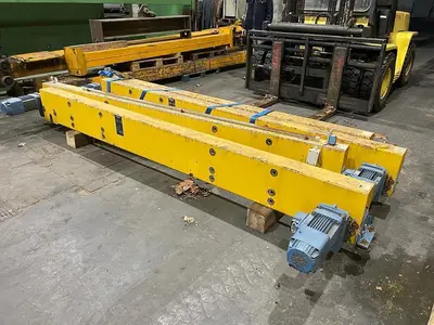 USED DEMAG 2 DEMAG 3.2 TON HOISTS AND 2 SIDE SUPPORTS
