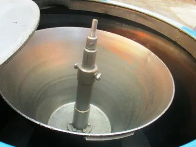 Barrett 1101-E spindle post type chip spinner with hoist.