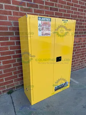 USED JUSTRITE 45 GALLON FLAMMABLE LIQUID STORAGE CABINET W/ SOFT CLOSE DOORS, KEY