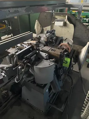 US Tool/BAIRD MODEL #11 MULTI-SLIDE WIRE FORMING MACHINE. STOCK # 121013A
