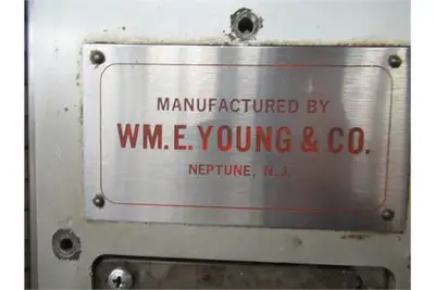 Young & Co. stand up filter pouch filler with inline feeder
