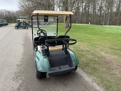 (1) 2015 E-Z-Go golf cart with a Kawasaki gas engine, does not include Club canopy, includes ball wa...