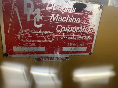 Douglas Machine tray packer with bottom/top magazine hopper 460V