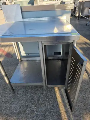 Used Falcon Restaurant Supply, Inc. Used 30"X 24.75" X 30" Stainless Steel Table with Shelf and Small Cabinet - SB2 - SS360 Food Prep Tables Illinois US | Falcon Restaurant Supply #1373772