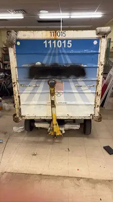 Used Airline Cargo Container with Team USA Graphics and Rolling Base