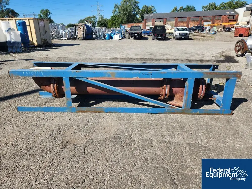 Unknown 12" diameter Teflon Pipe, C/S shell