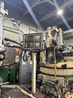 60" GRAY CNC VERTICAL TURRET LATHE. STOCK # 0888925