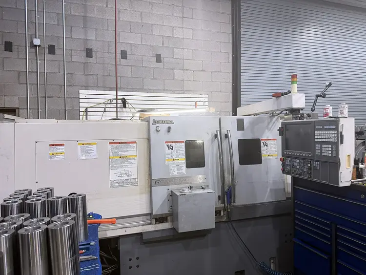 Used 2013 OKUMA L300E-M CNC Lathes Illinois US | Machinery Marketing International #1229252