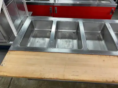 Used Duke Used Duke E-6-CBSS_208/60/1 Thurmaduke Steam Table w/ 6 Wells & Undershelf, 240v Steam Tables (Food) Illinois US | Falcon Restaurant Supply #1376346