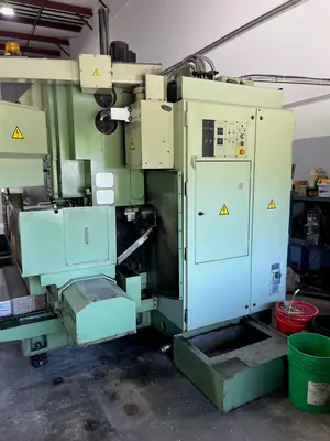 USED 1989 OKUMA MC-4VA