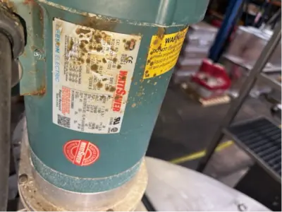 1775 Gallon Stainless Steel tank W/ Mixer for sale