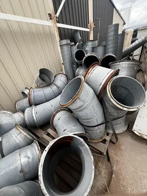 Air conveying scrap system with 100's of feet of piping