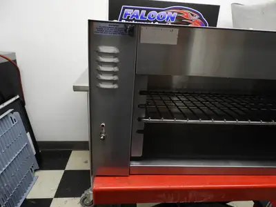 New | in-Stock APW Wyott Used APW Wyott CMC-36 36 1/2" Countertop Cheese Melter New Elements - 208V Salamanders & Cheese Melters Illinois US | Falcon Restaurant Supply #1376472