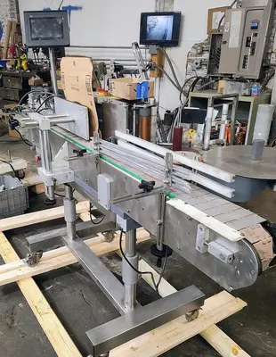 USED CVC 300 PRESSURE SENSITIVE WRAP LABELER