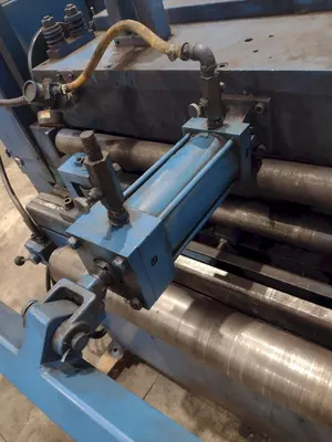 24" COOPER WEYMOUTH 7 ROLL MOTORIZED POWERED COIL STRIP STRAIGHTENER: STOCK #23702