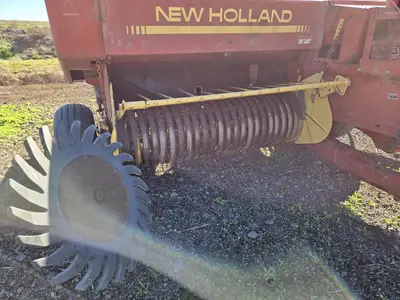 USED 1990 NEW HOLLAND 515
