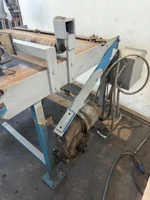 48” X 4" ARBOR STRILICH SLITTING LINE WITH FAMCO CUT OFF SHEAR & AMS CONTROLS. STOCK # 0664425