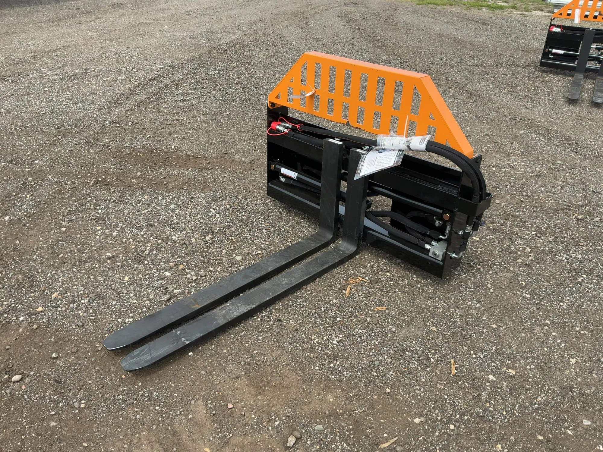 Used WOLVERINE PFA-11-3300G SKID STEER PALLET FORK HYDRAULIC ADJUSTABLE Pallet Forks Michigan US | Miedema Asset Management Group #1468694