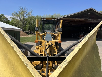 USED 2004 JOHN DEERE 670C SERIES 2