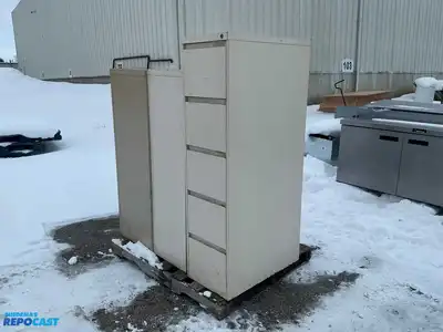 Lot of (2) metal filing cabinets including a 15”x29”x52” cabinet with 4 drawers and a 15”x29”x59”...