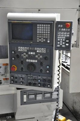 USED OKUMA 2SP-30H TWIN SPINDLE CNC + GANTRY ROBOT