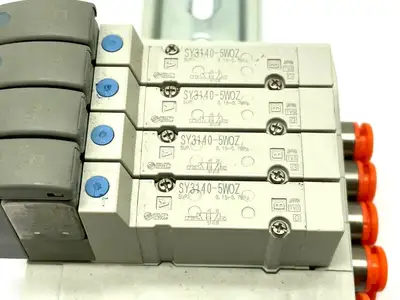 SS5Y3-45-04D-N7 | SMC  Stacking Manifold w/ SY3140-5WOZ Solenoids - Used