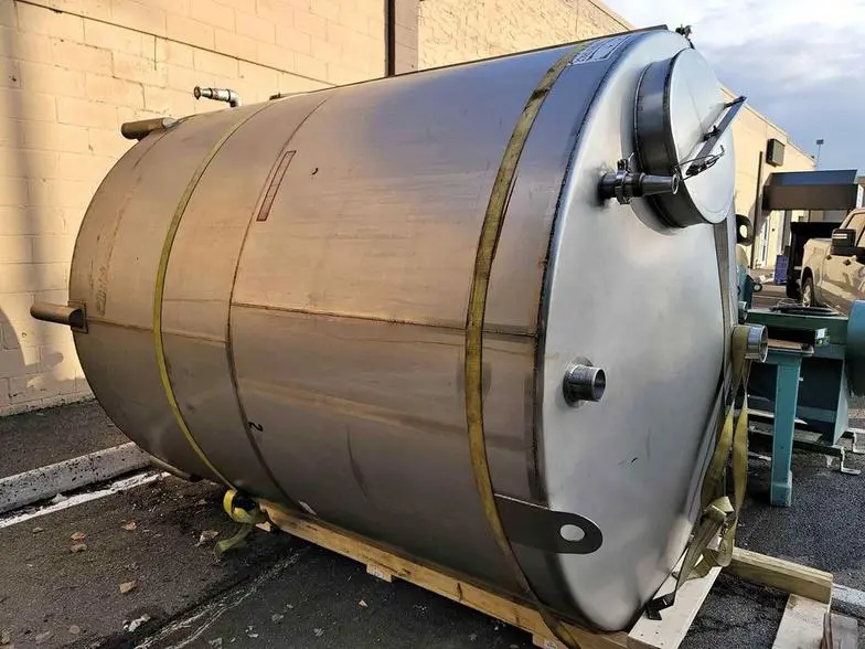 Used approximately 2300 gallon vertical sanitary stainless steel vertical tank