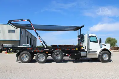 New | in-Stock 2027 PETERBILT 548 Rolloff Trucks Texas US | Roll Off Truck World #1492018