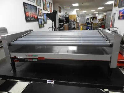 Used Nemco Used Nemco 8250-SLT 50 Commercial Hot Dog Roller Grill - Slanted Top, 120v Grills & Griddles Illinois US | Falcon Restaurant Supply #1376520